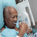 Toothbrushing reducing pneumonia in hospitalized patients